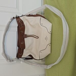 NWT COACH LEATHER MICKIE DRAW STRING PURSE. COMES WITH 2 STRAPS SHORT/LONG